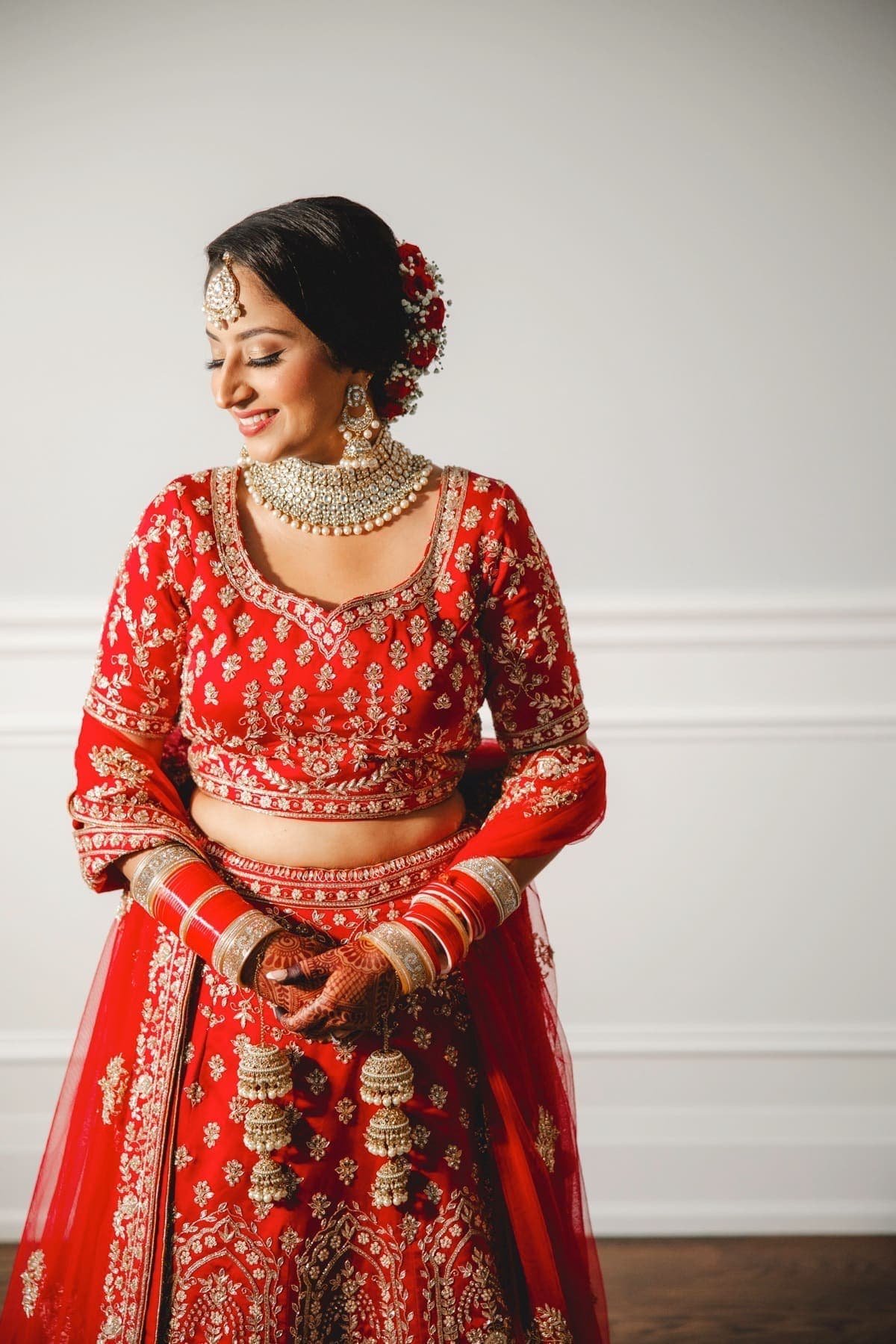 A bride styled and celebrated at a Taj Raj Events wedding